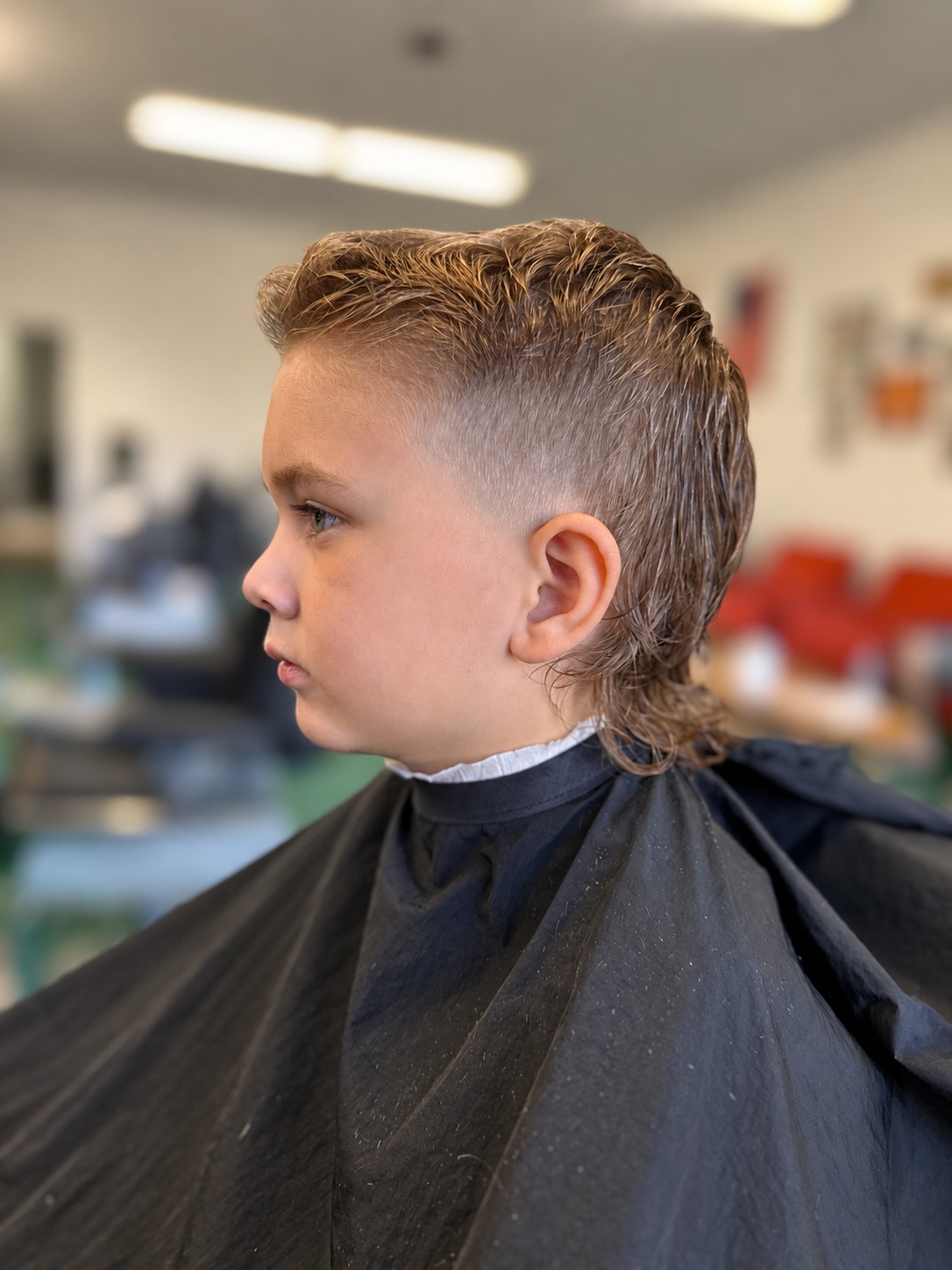 Curly mullet haircut by Kandice Maxine